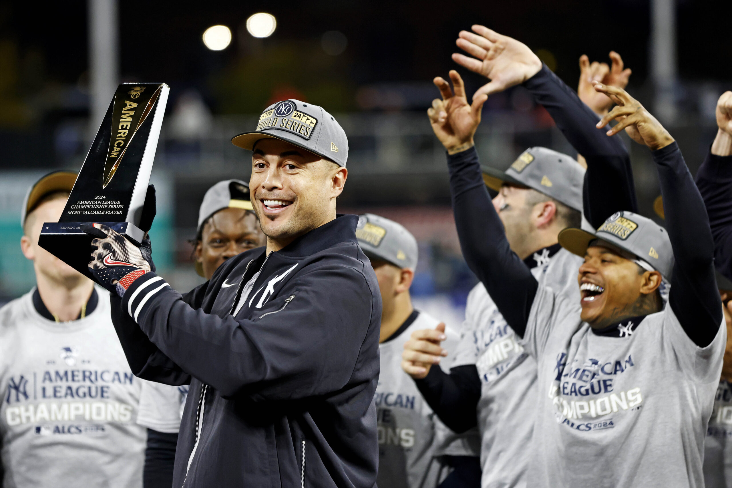 Giancarlo Stanton holding trophy