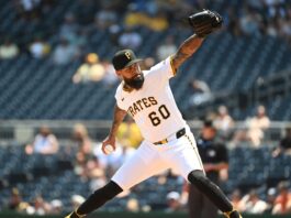 Pirates' Dennis Santana Attempts to Strike a Fan