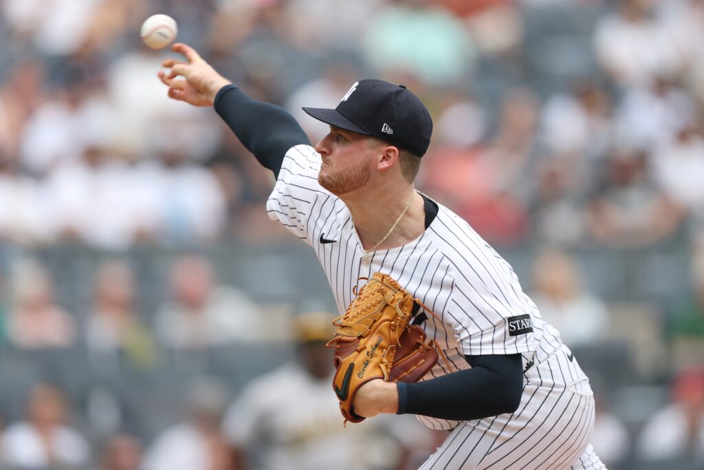 Yankees' Schmidt Pitched Through Pain — and Delivered